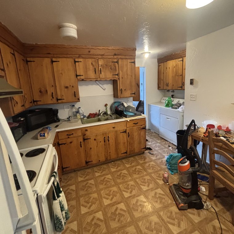 Kitchen cleanout before — cluttered